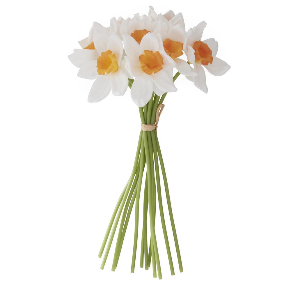 Bouquet of white daffodils with orange centers and green stems tied with twine on a white background.