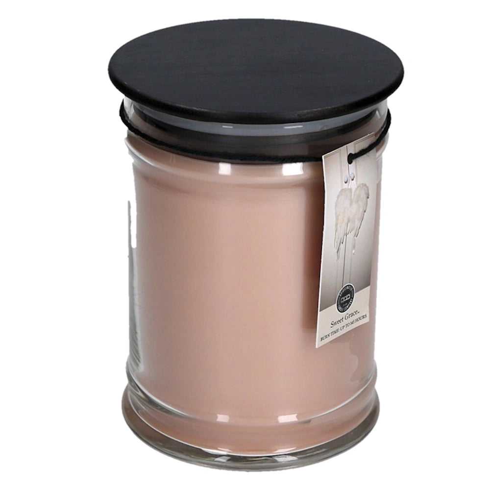 Large clear glass jar candle filled with beige wax, featuring a black lid and a Sweet Grace tag.