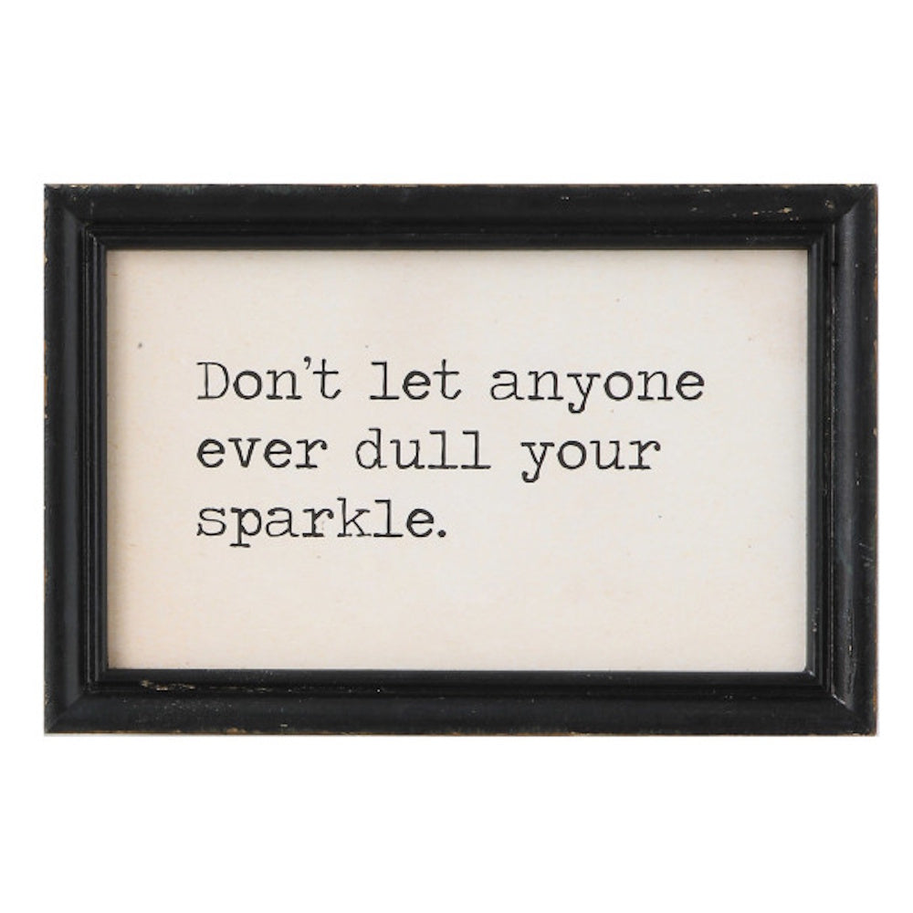 Don't let anyone ever dull your sparkle wood wall decor sign with a rustic black frame and typewriter font.