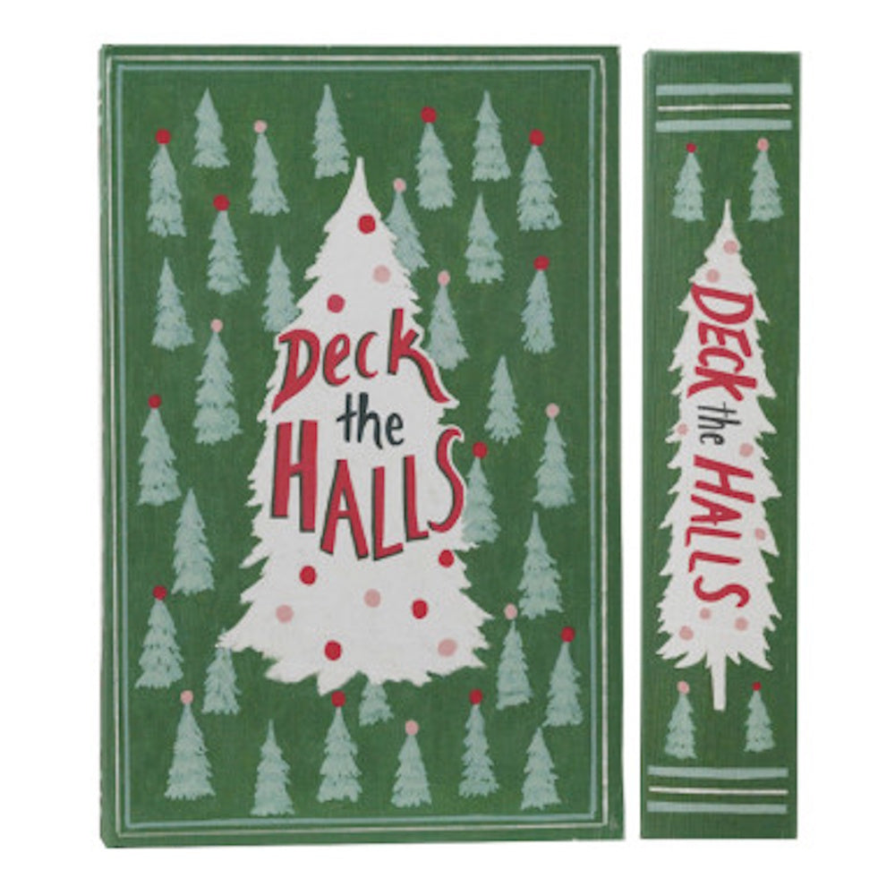 Green Christmas book-shaped storage box featuring "Deck the Halls" and pine trees.
