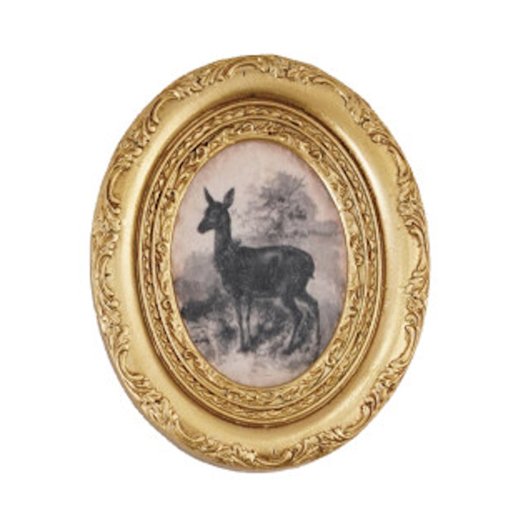Vintage-style ornate gold oval frame featuring a sketch of a deer in a landscape.