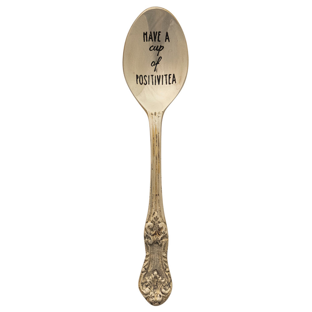 Vintage brass tea spoon engraved with Have a cup of POSITIVITEA.