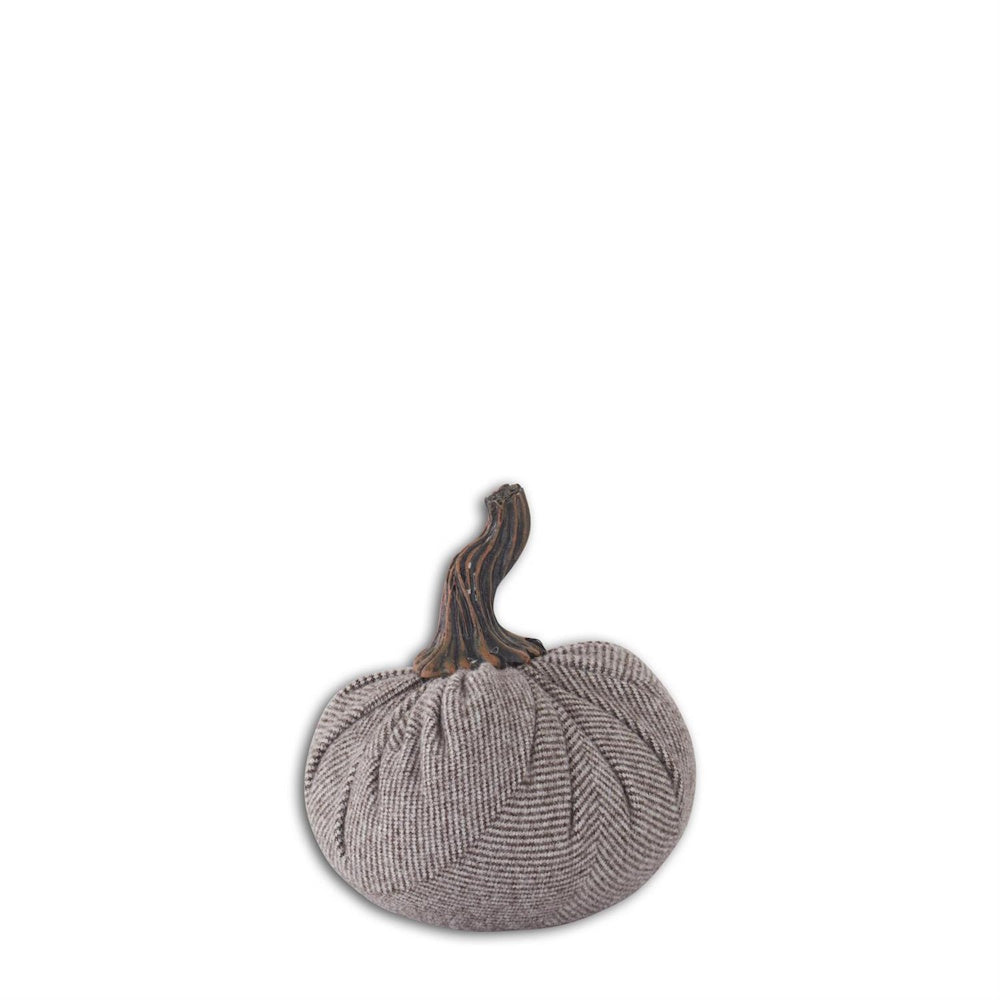 Small grey fabric pumpkin with thin stripes and a brown twisted stem on a white background.