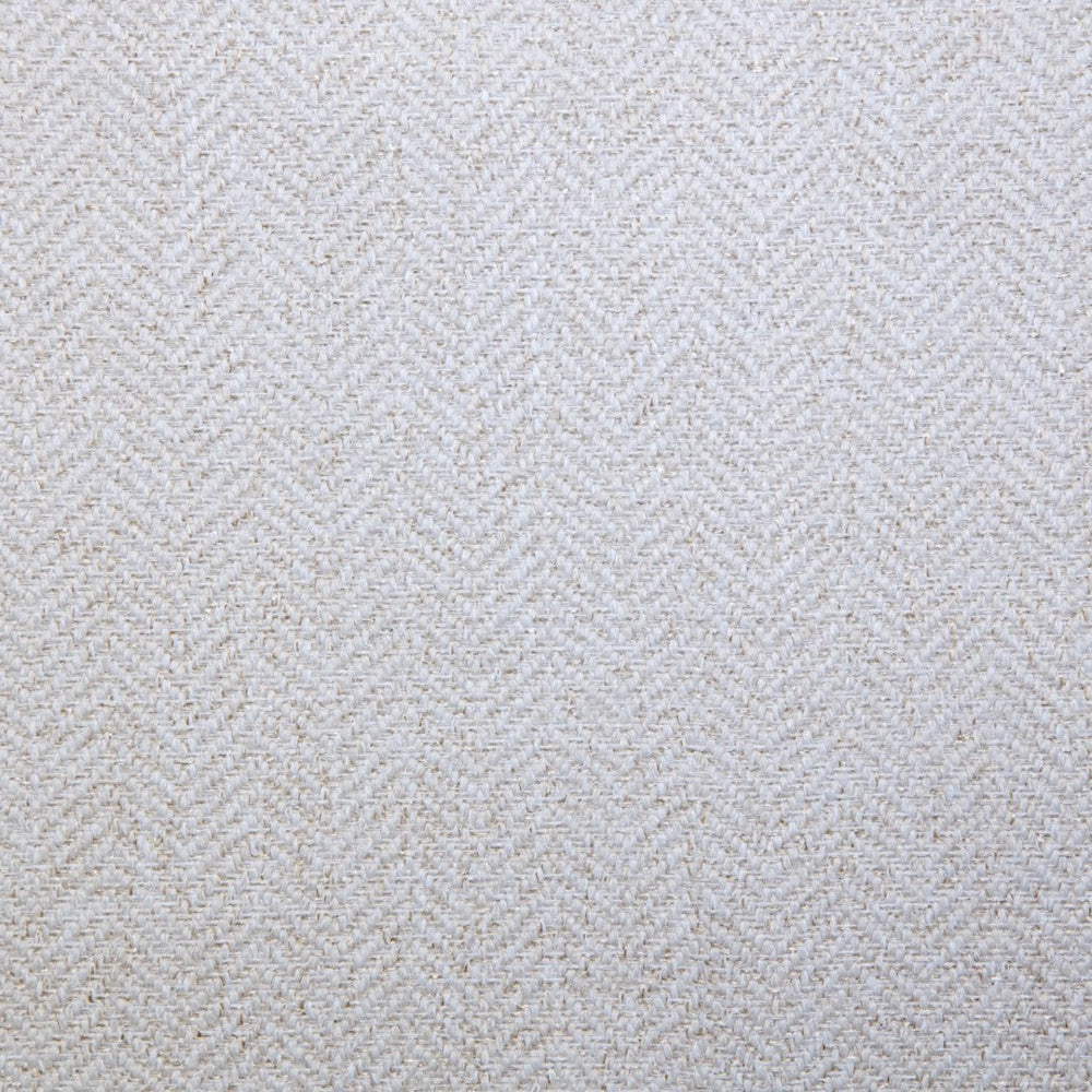 A close-up view of a light-colored woven chevron fabric texture.