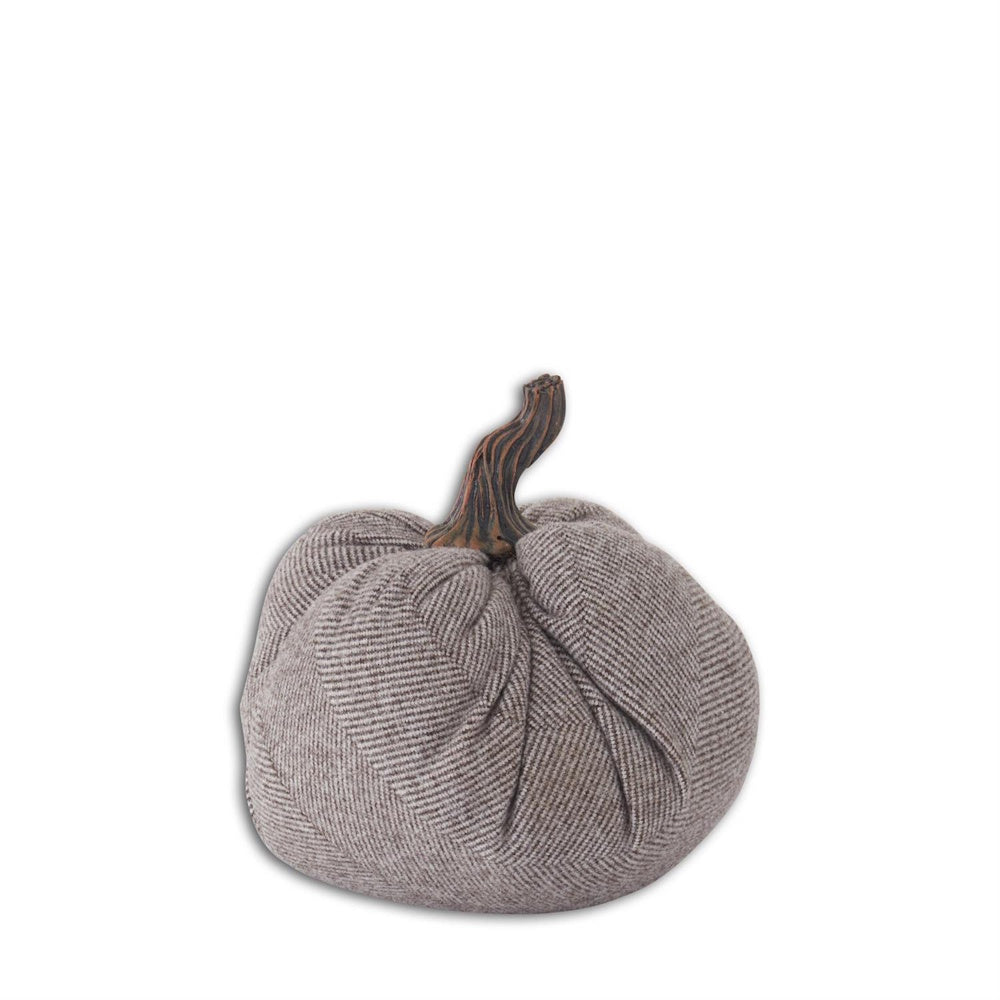 A gray herringbone textured fabric pumpkin decor piece with a brown stem on a white background.
