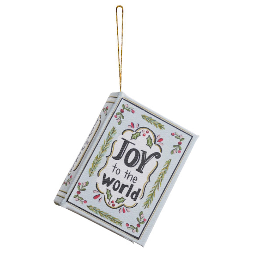 Miniature book ornament reading "JOY to the world" with festive holly and pine details.