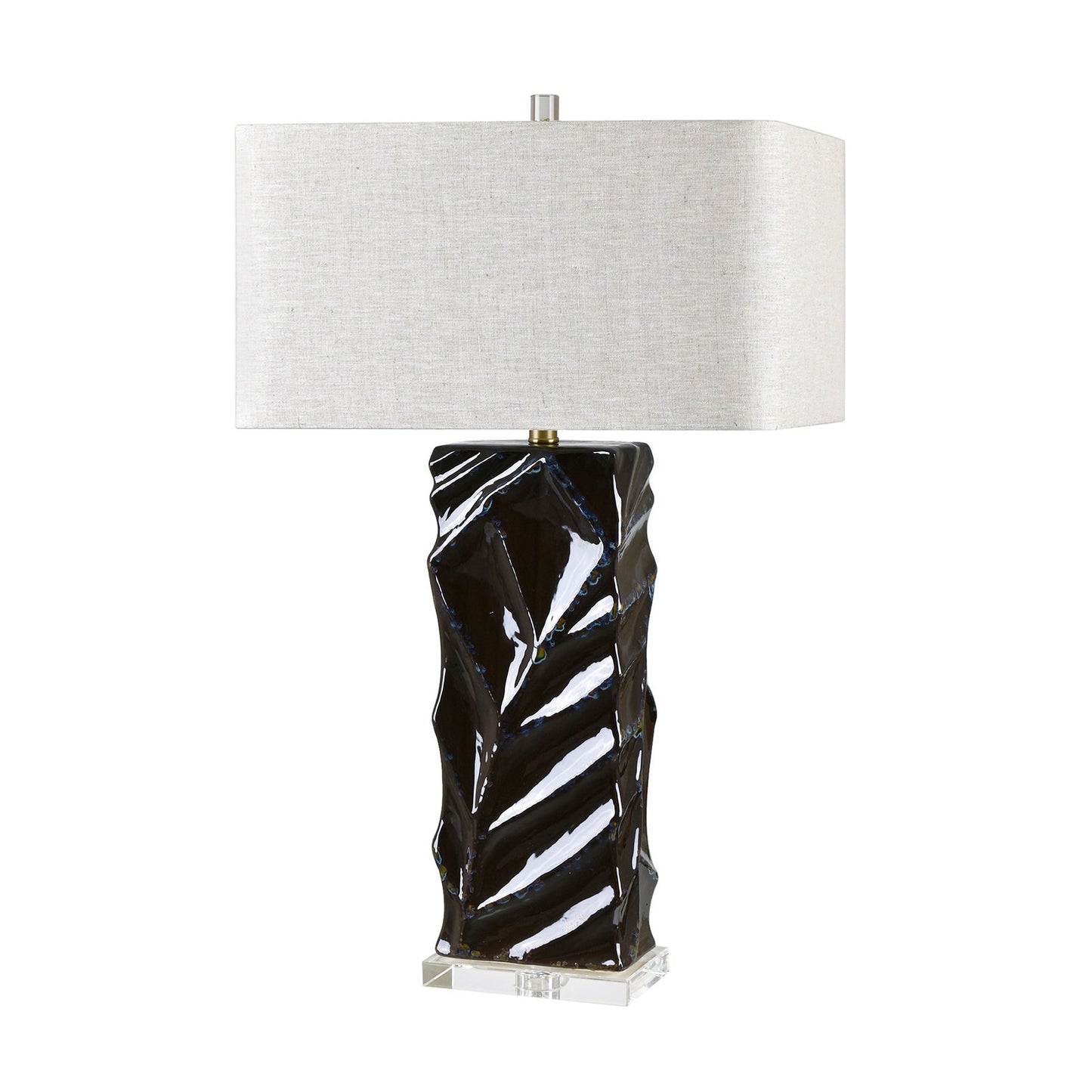 Table lamp with black textured base and white shade on a white background