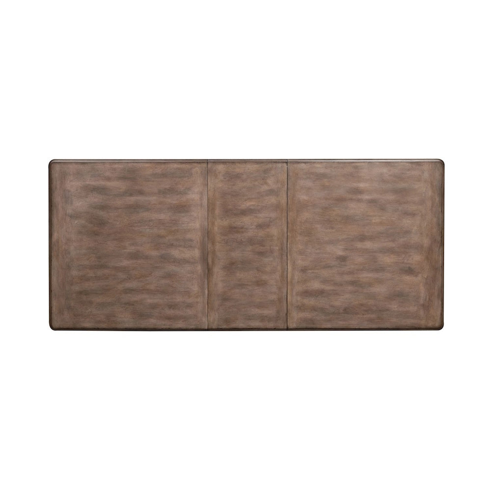 Top-down view of a rectangular brown wooden tabletop with three distinct sections and rounded corners.