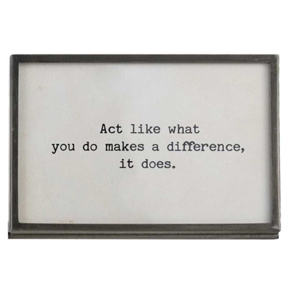 Gunmetal finish metal and glass frame with an easel back featuring the quote "Act like what you do makes a difference, it does."