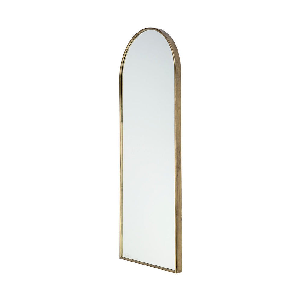 Side-angle view of a full-length arched mirror with a gold metal frame on a white background.