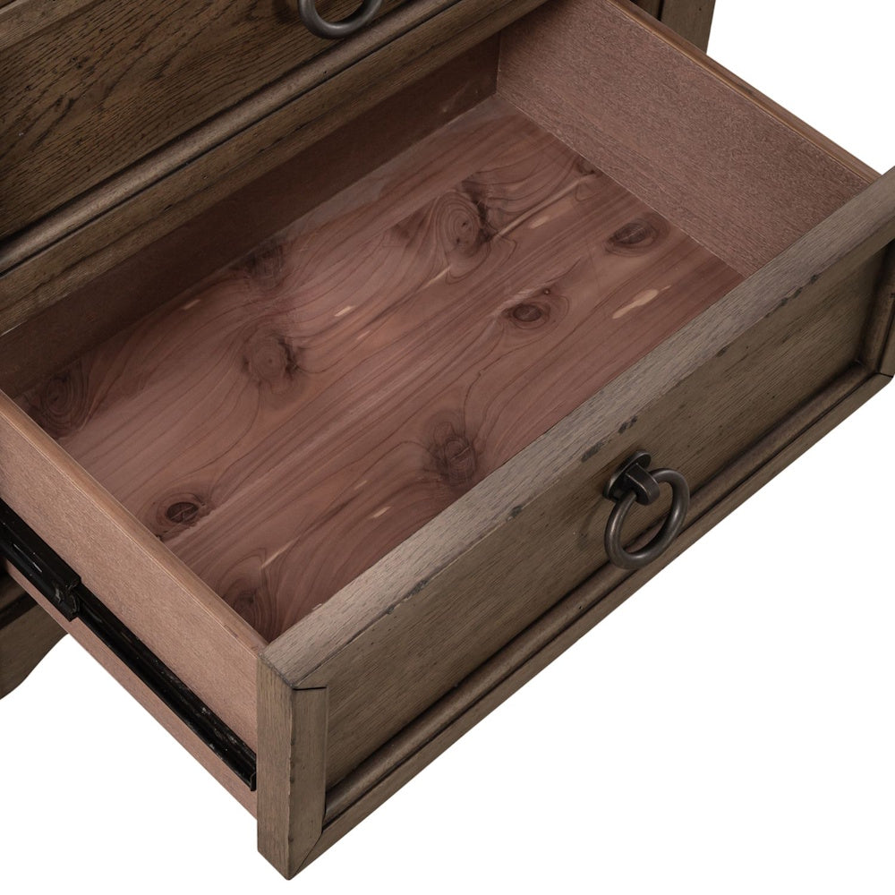 Open brown wooden nightstand drawer showing a cedar-lined interior and metal side glides.