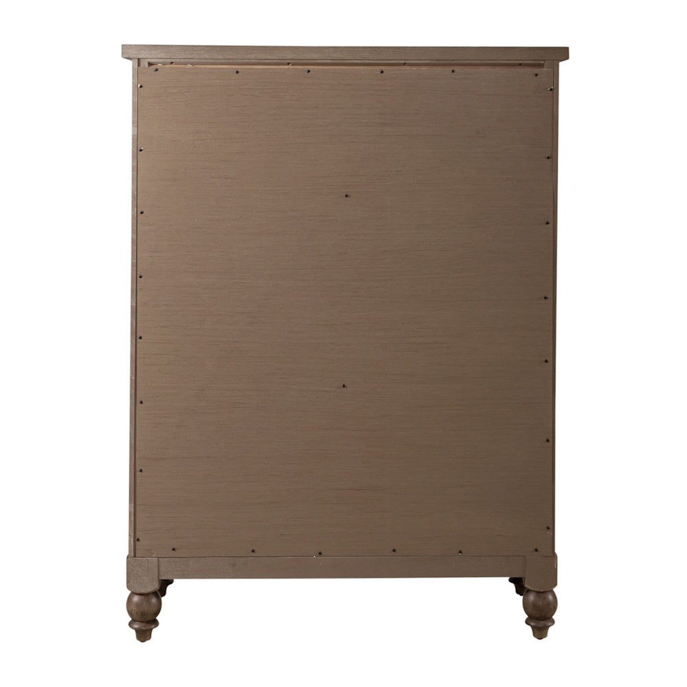 Back view of a brown wooden chest of drawers with turned feet and a flat, finished back panel.