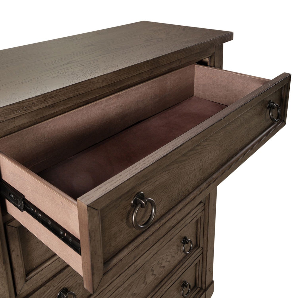 Open brown wooden dresser top drawer displaying a felt-lined interior and metal side glides.