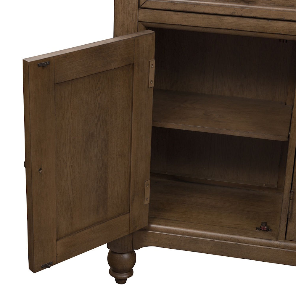 Open wooden cabinet door revealing an interior shelf on a brown rustic farmhouse buffet.