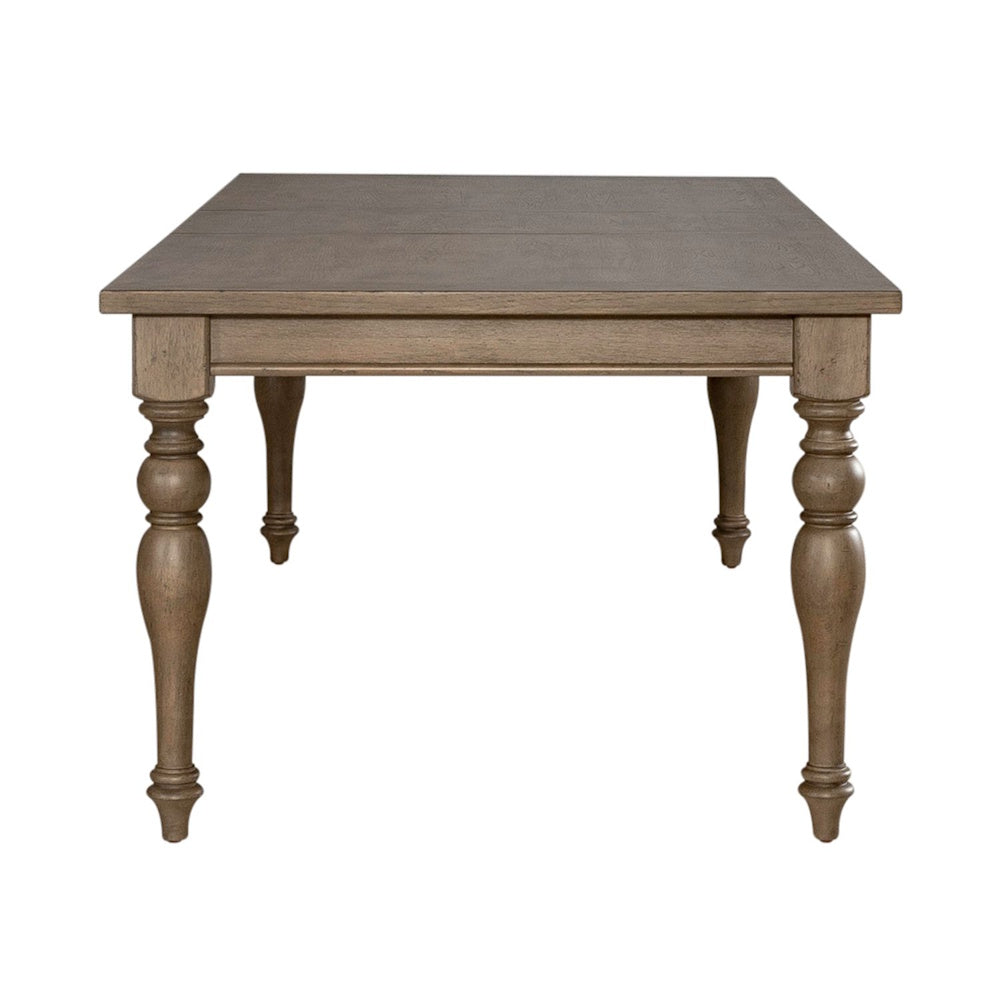 Side view of an Americana Farmhouse rectangular leg dining table with turned wooden legs.