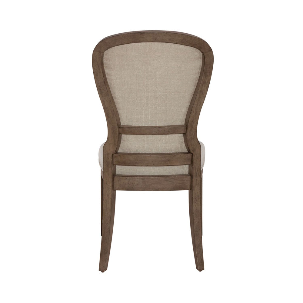 Back view of Americana farmhouse upholstered dining side chair.
