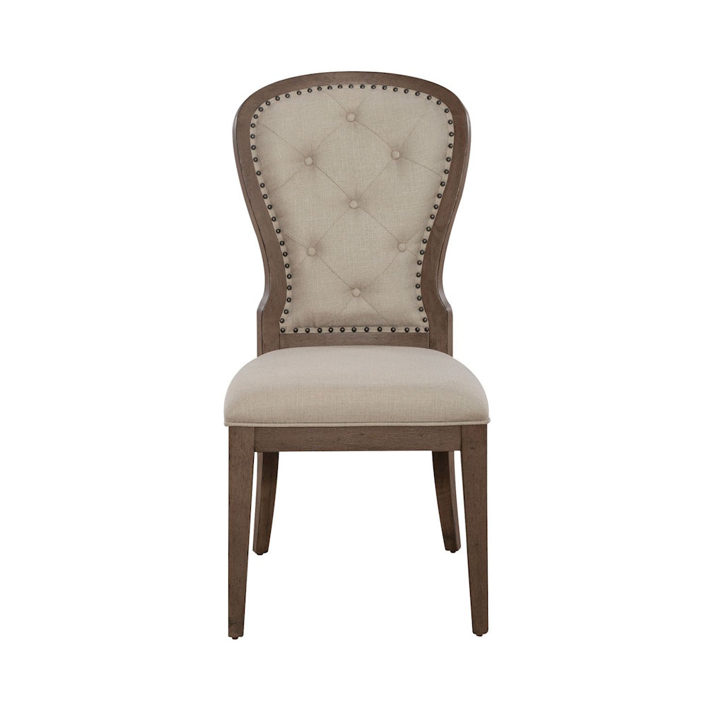 Americana Farmhouse upholstered tufted back side chair front view with fabric seat and nailhead trim.