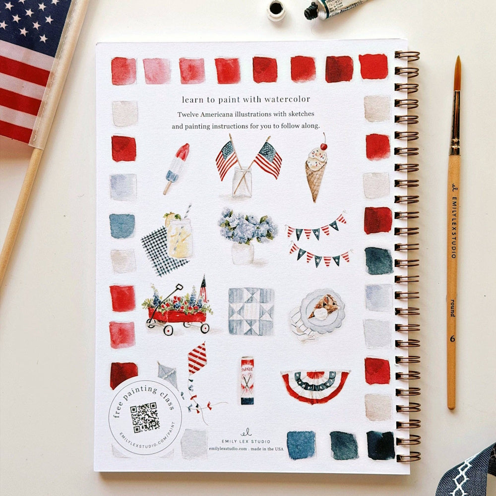 Americana watercolor workbook back cover featuring red and blue swatches, festive illustrations, and a paintbrush.