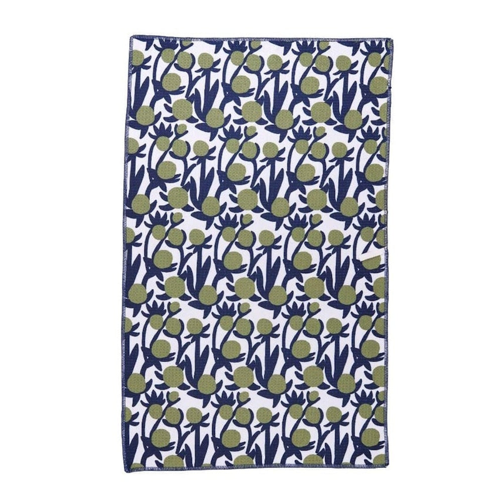 Back view of a white kitchen tea towel featuring a repeating green and navy blue anemone poppy floral pattern.