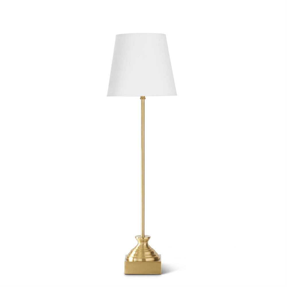 Antique brass metal buffet lamp featuring a slim pedestal base and a classic white tapered fabric lampshade.