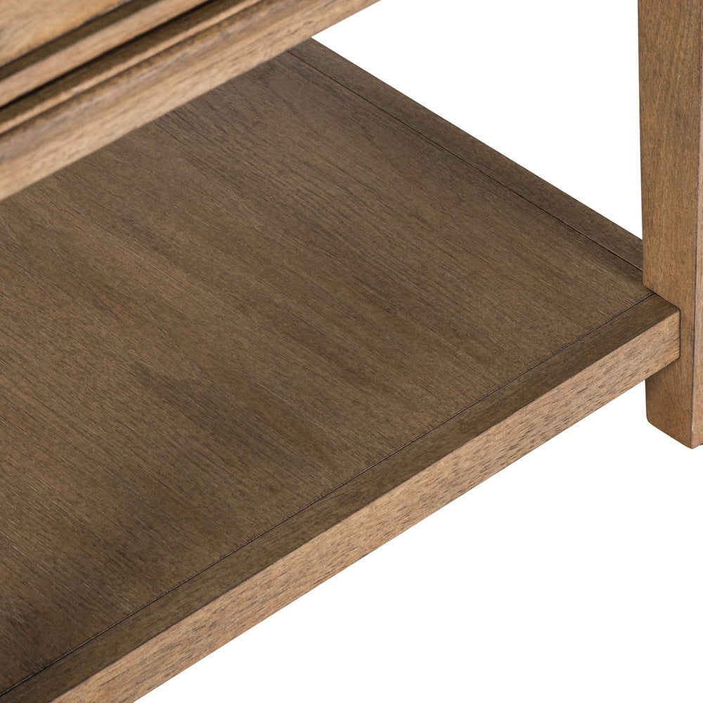 Close-up of the lower wooden shelf and leg base of a light-brown wooden end table.