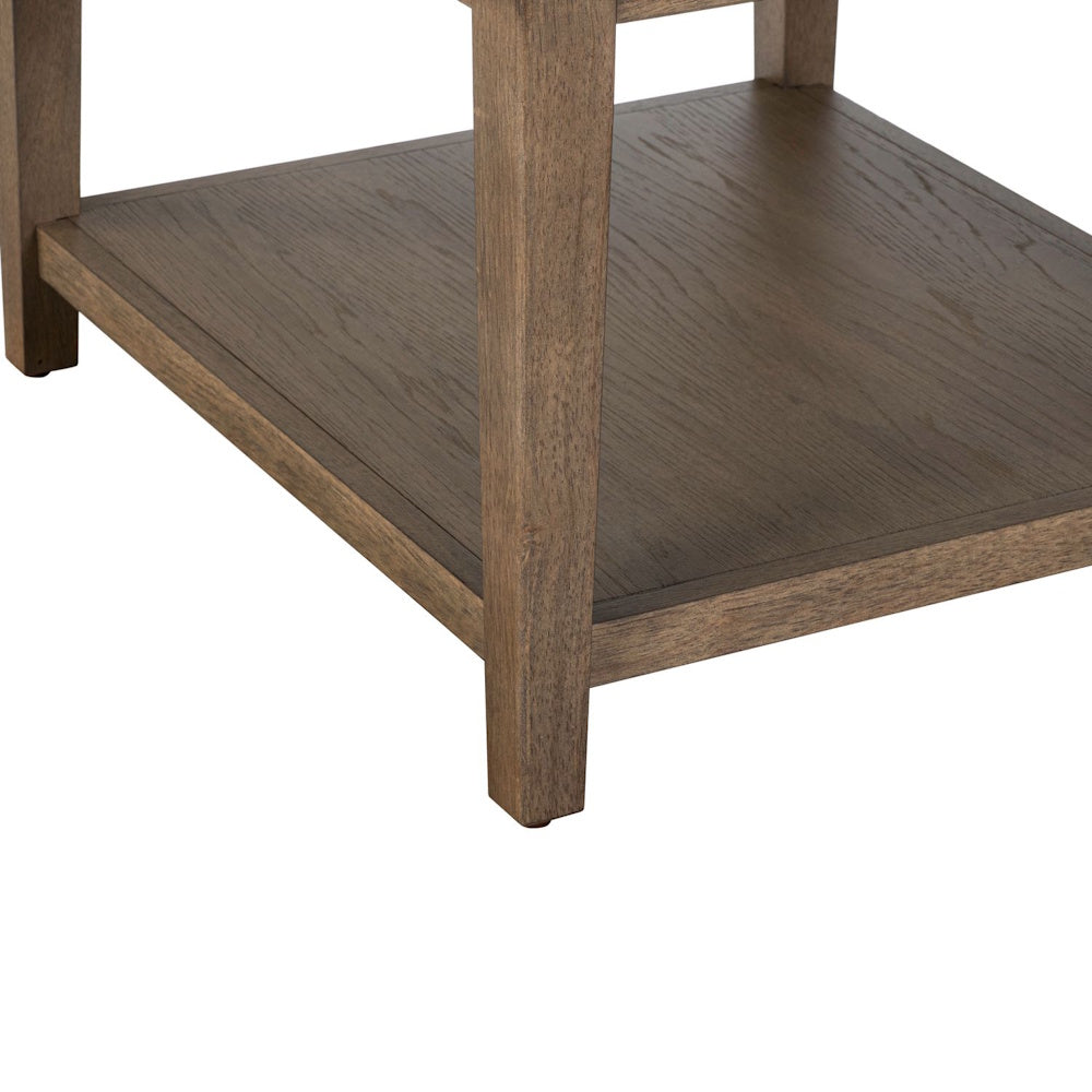 Close-up of a brown wood table base showing straight legs, visible wood grain, and a lower open shelf.