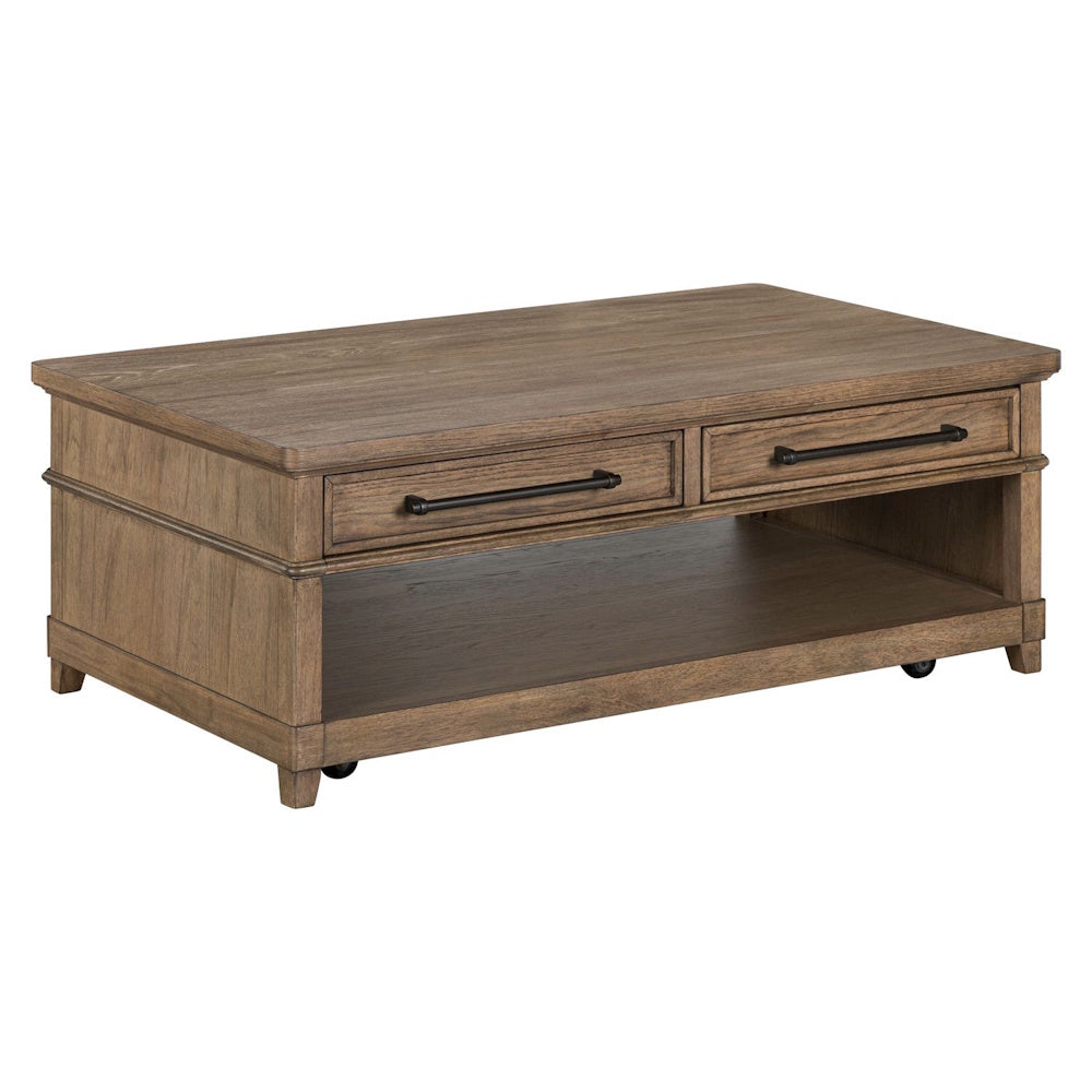 Rectangular wooden coffee table with two drawers, black metal handles, a lower open shelf, and caster wheels.