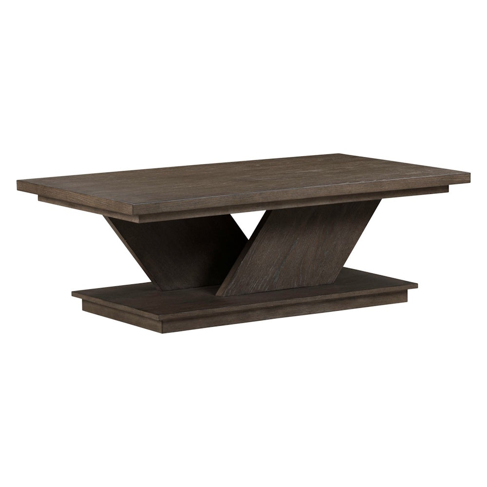 Modern dark wood Aspen Sky cocktail table featuring a geometric pedestal base and a rectangular planked tabletop.