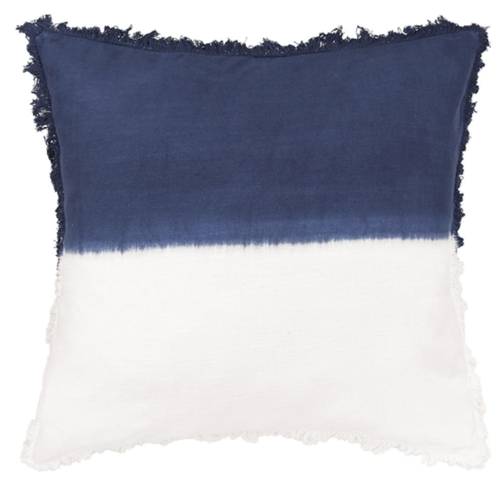 Navy and white dip dyed euro sham pillow with fringed edges and modern coastal style design.