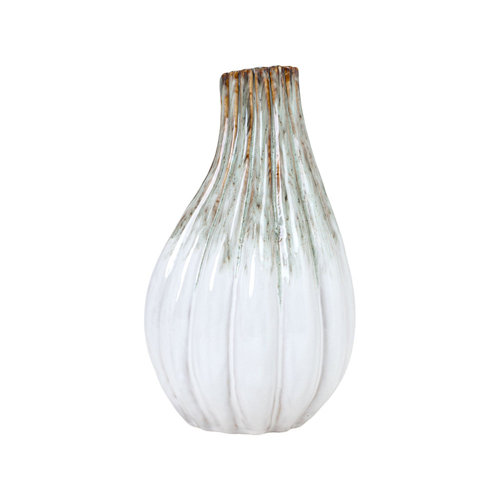 Tall ribbed white stoneware vase with green and brown glazed neck detail on a white background.