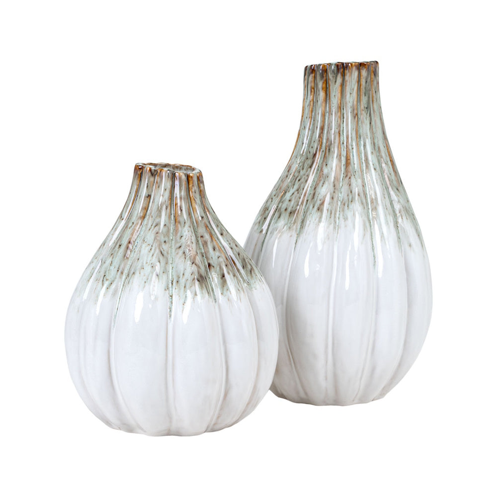 Two Audrix stoneware vases in varying heights featuring a white ribbed texture and rustic brown and green glazed necks.