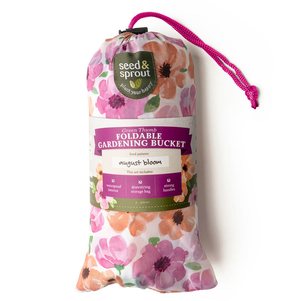 Seed & Sprout foldable gardening bucket packed in a pink and orange floral drawstring bag.
