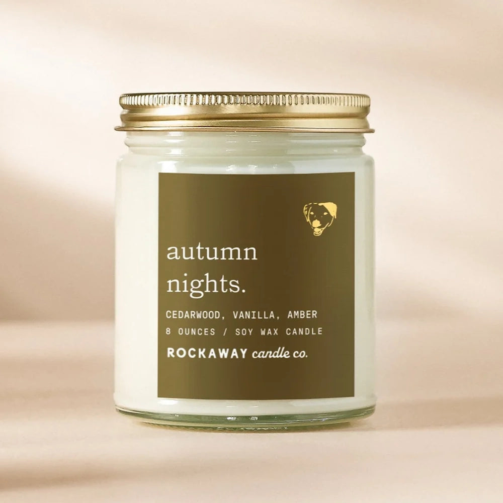 Rockaway Candle Co. Autumn Nights 8oz soy wax candle with cedarwood, vanilla, and amber scents.