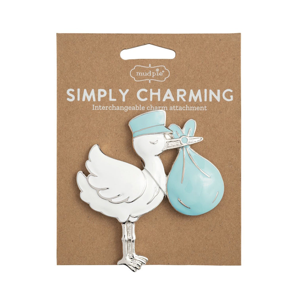 Mud Pie baby boy stork interchangeable charm attachment on brown cardboard packaging.