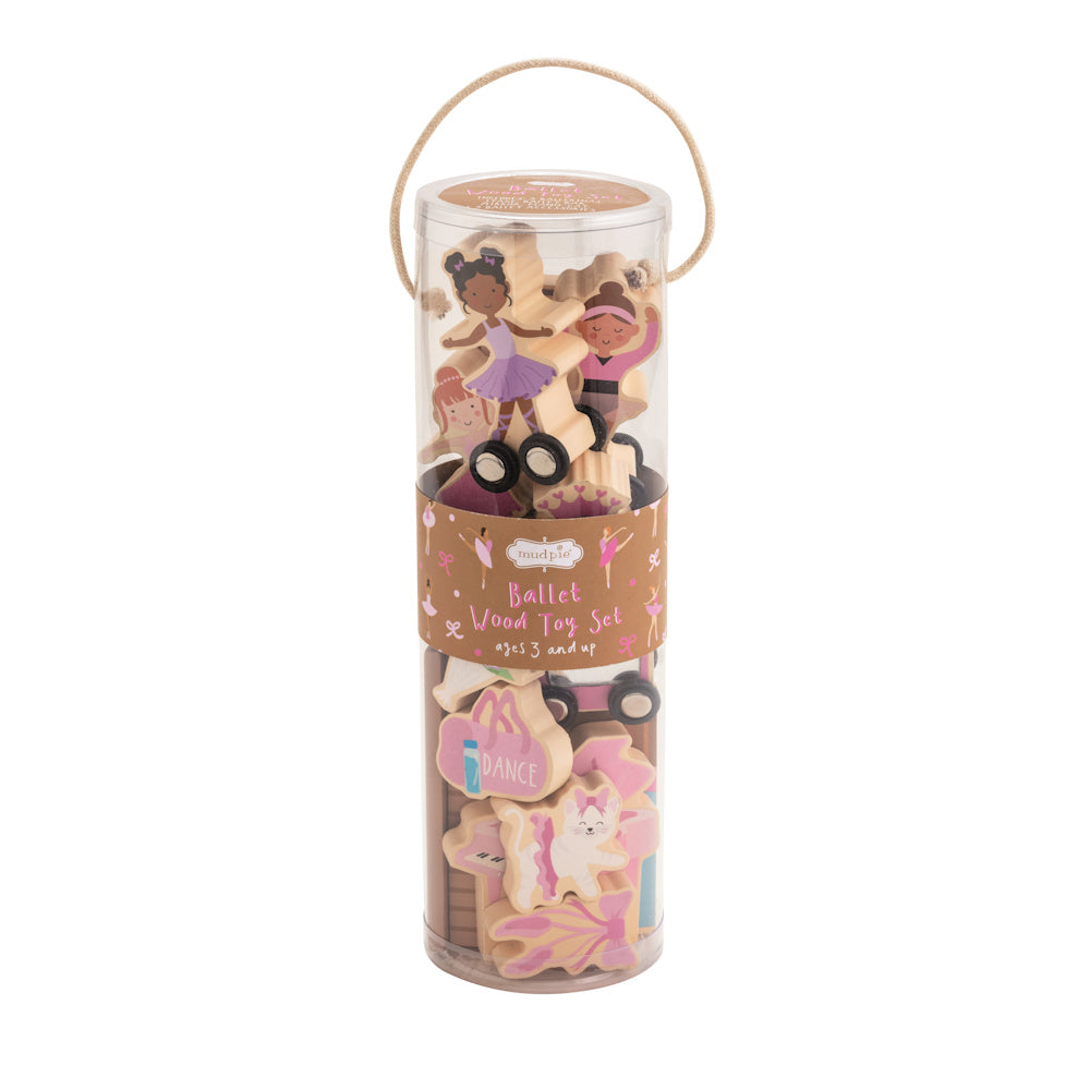 Mud Pie Ballet Wood Toy Set in a clear cylindrical tube with a rope handle, featuring wooden ballerina and cat figurines.