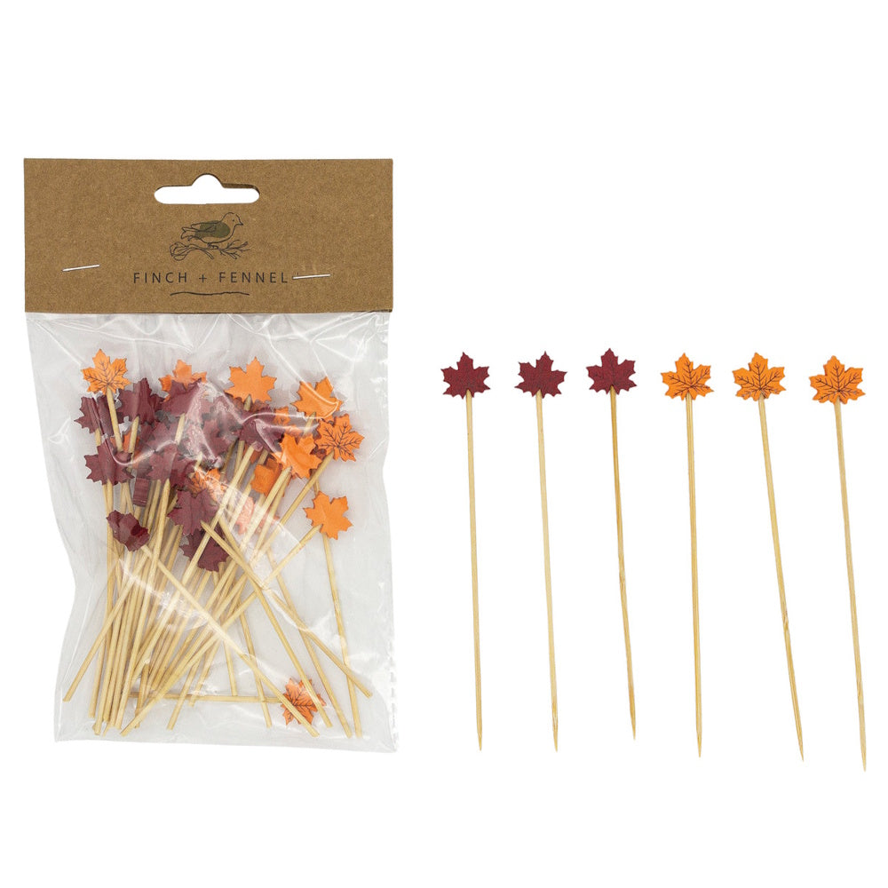 Packaged wooden picks topped with autumn-colored maple leaf tops.