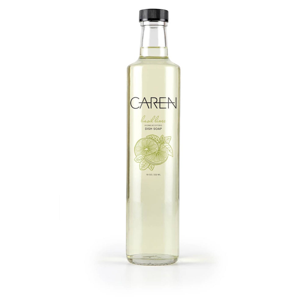 Simple, tall glass bottle of Caren Basil Lime dish soap with a black cap on a white background.
