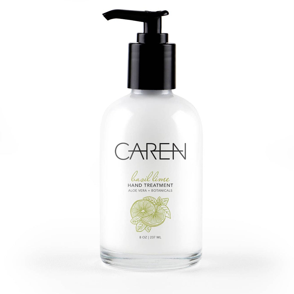 White bottle of Caren Basil Lime Hand Treatment with a black pump, featuring a green citrus and herb graphic.