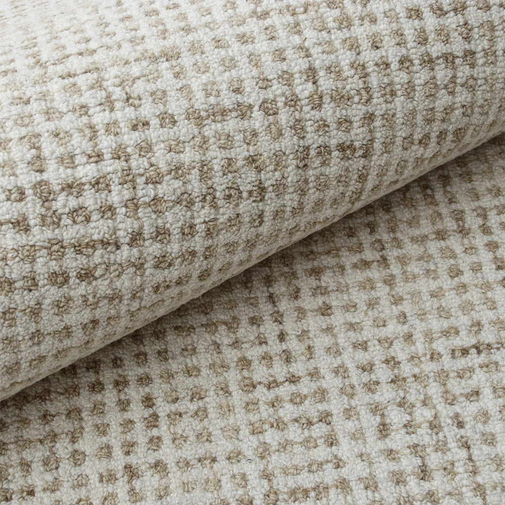 Textured beige and cream loop pile carpet with a geometric grid pattern and soft woven finish.