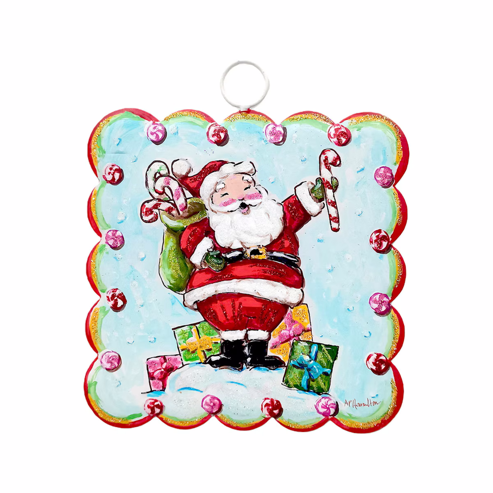 Front view of the red and white Santa art plaque featuring a painted wooden design with colorful gifts.