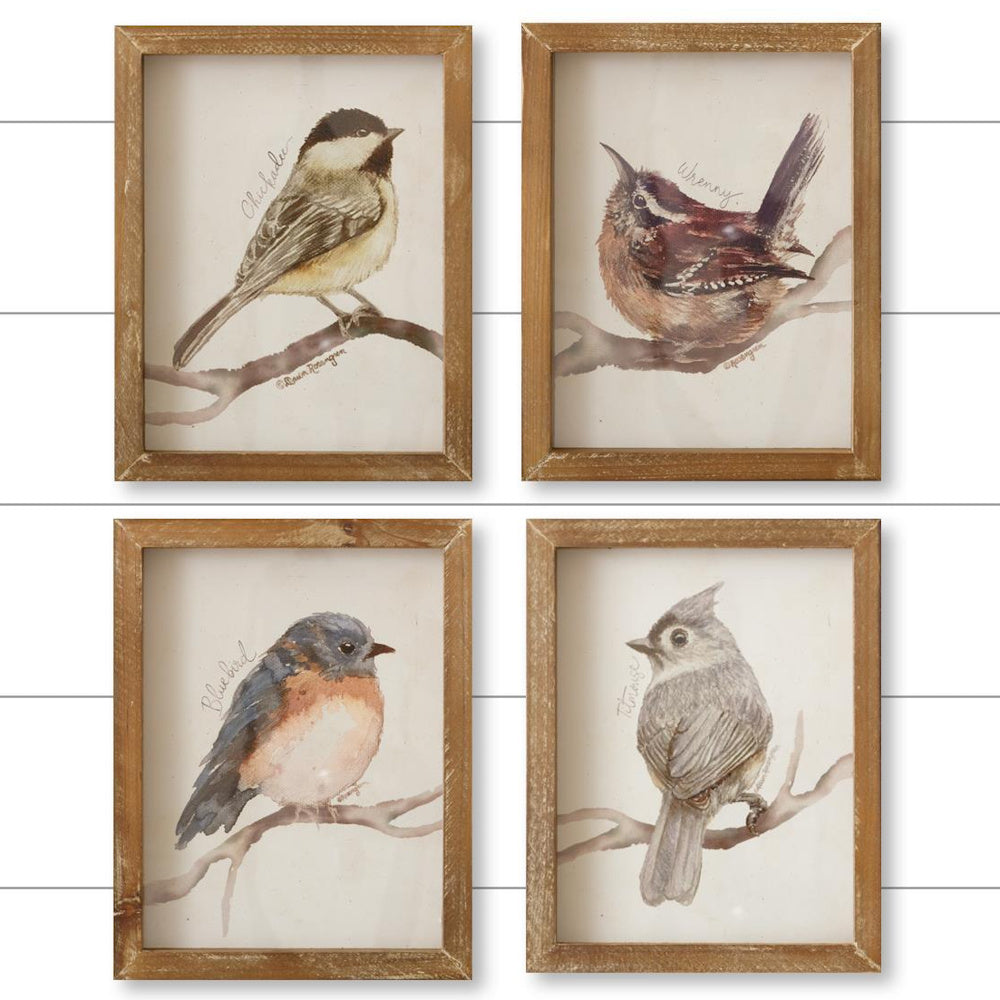 Set of four framed watercolor bird prints featuring a chickadee, wren, bluebird, and titmouse in rustic wooden frames.