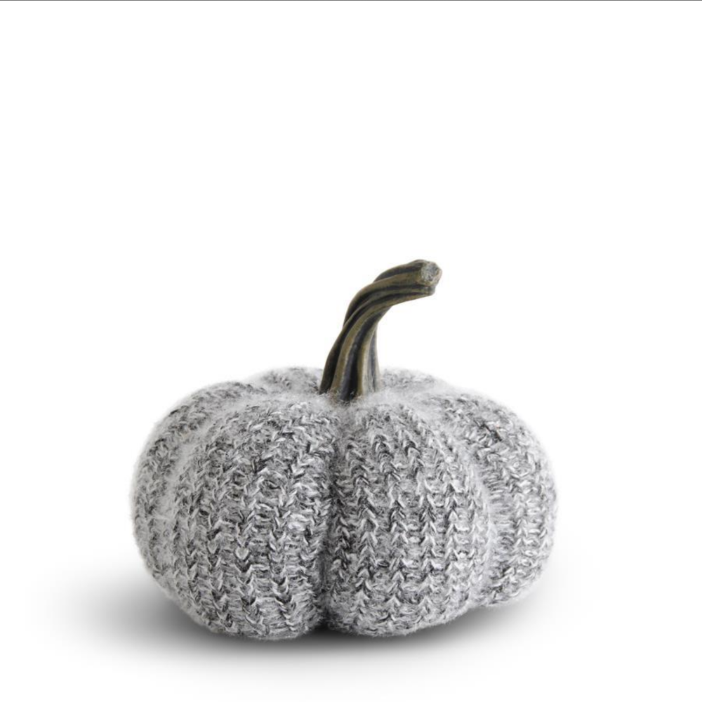 Decorative grey and white knit fabric pumpkin featuring a realistic curved resin stem.