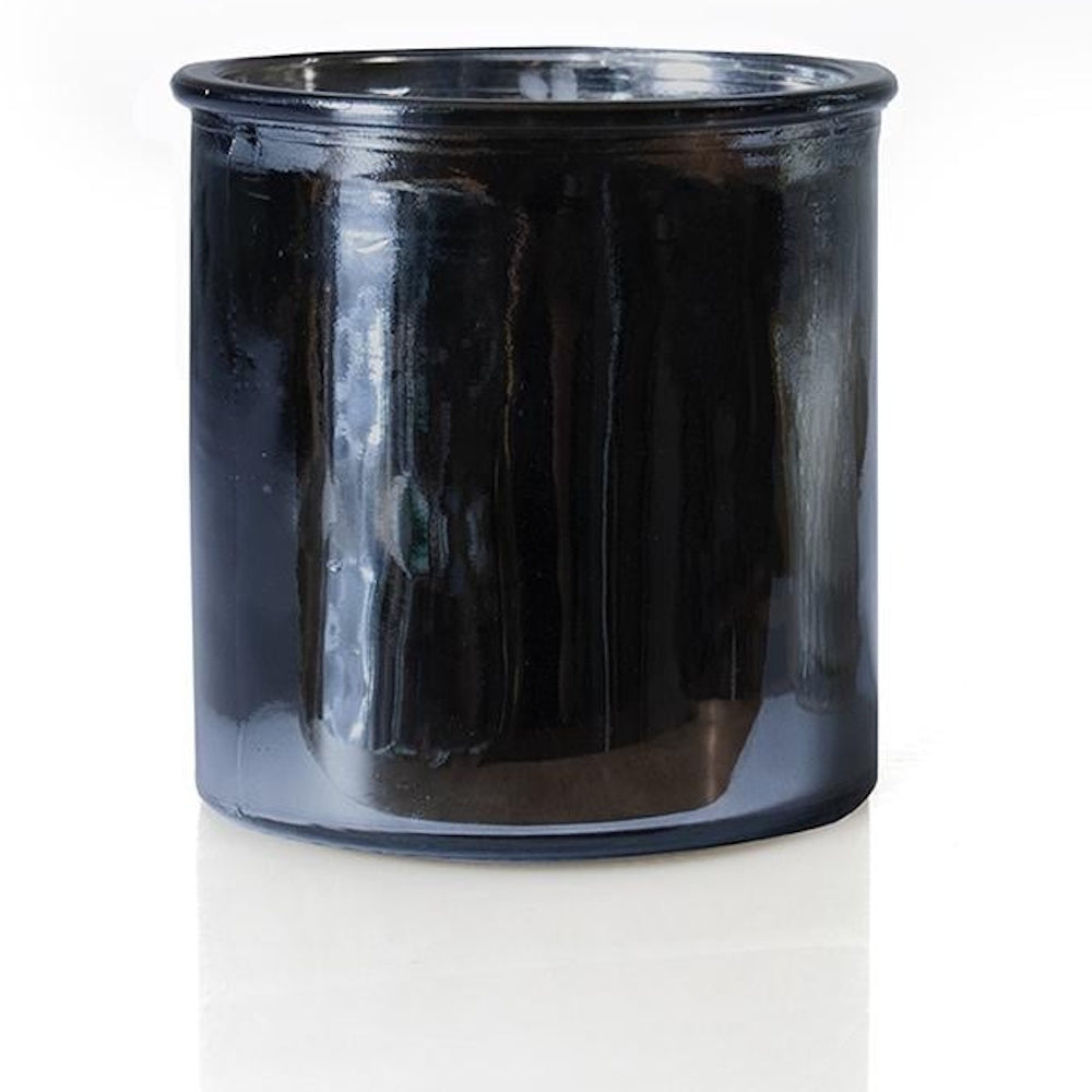 A glossy, dark gunmetal grey cylindrical candle jar on a white background with a subtle reflection.