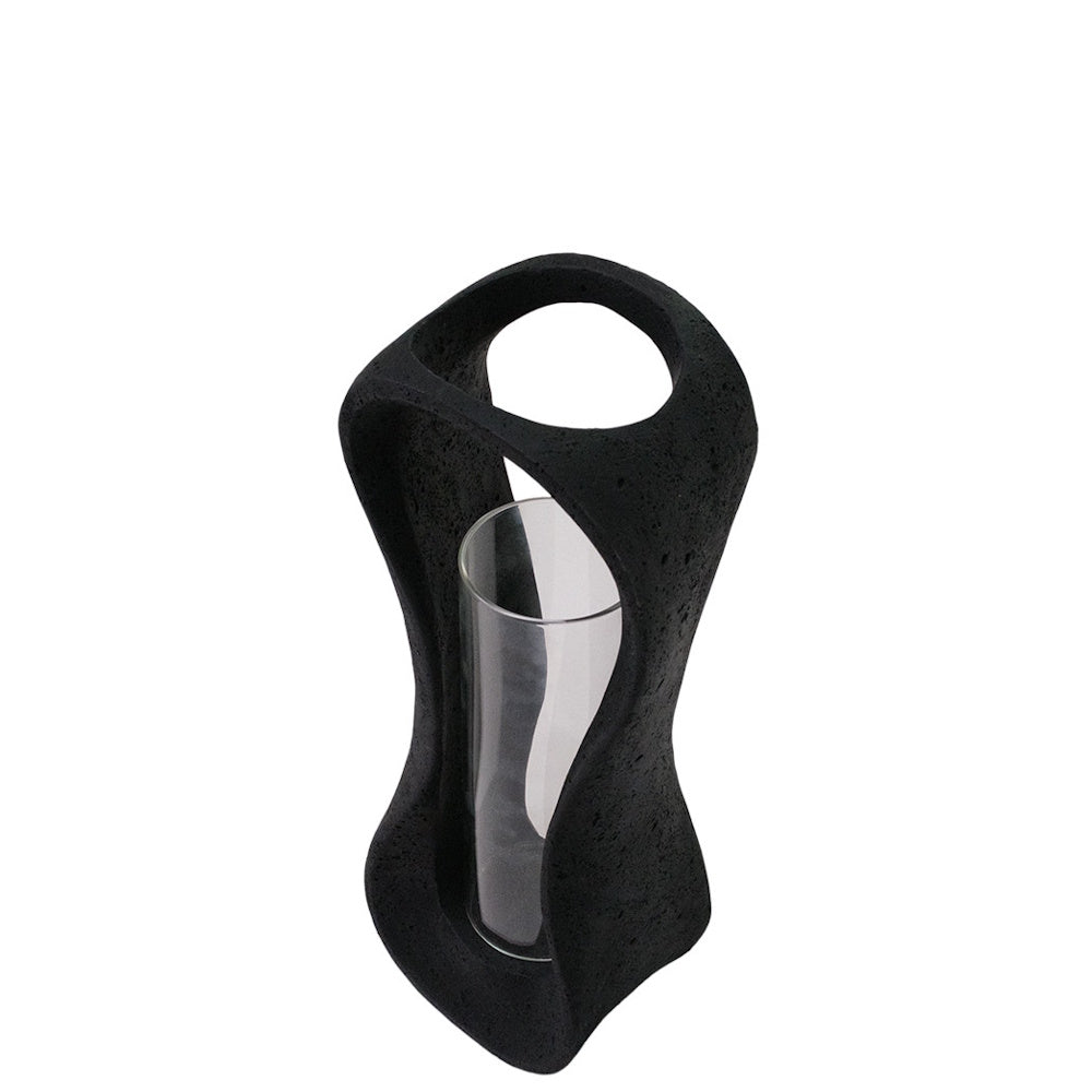 Modern black lava stone hurricane candle holder with clear glass insert, ideal for contemporary minimalist home decor.