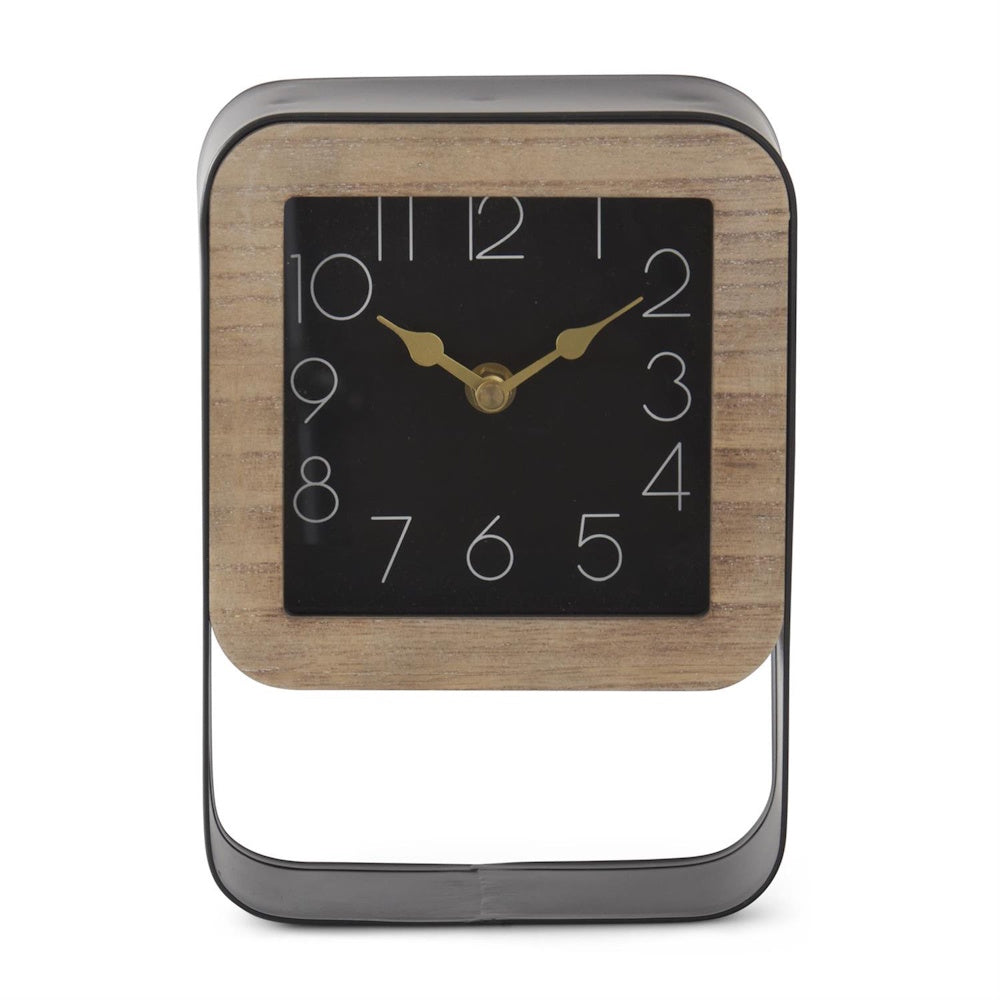 Square analog clock with a wooden trim inside a dark metal open frame.