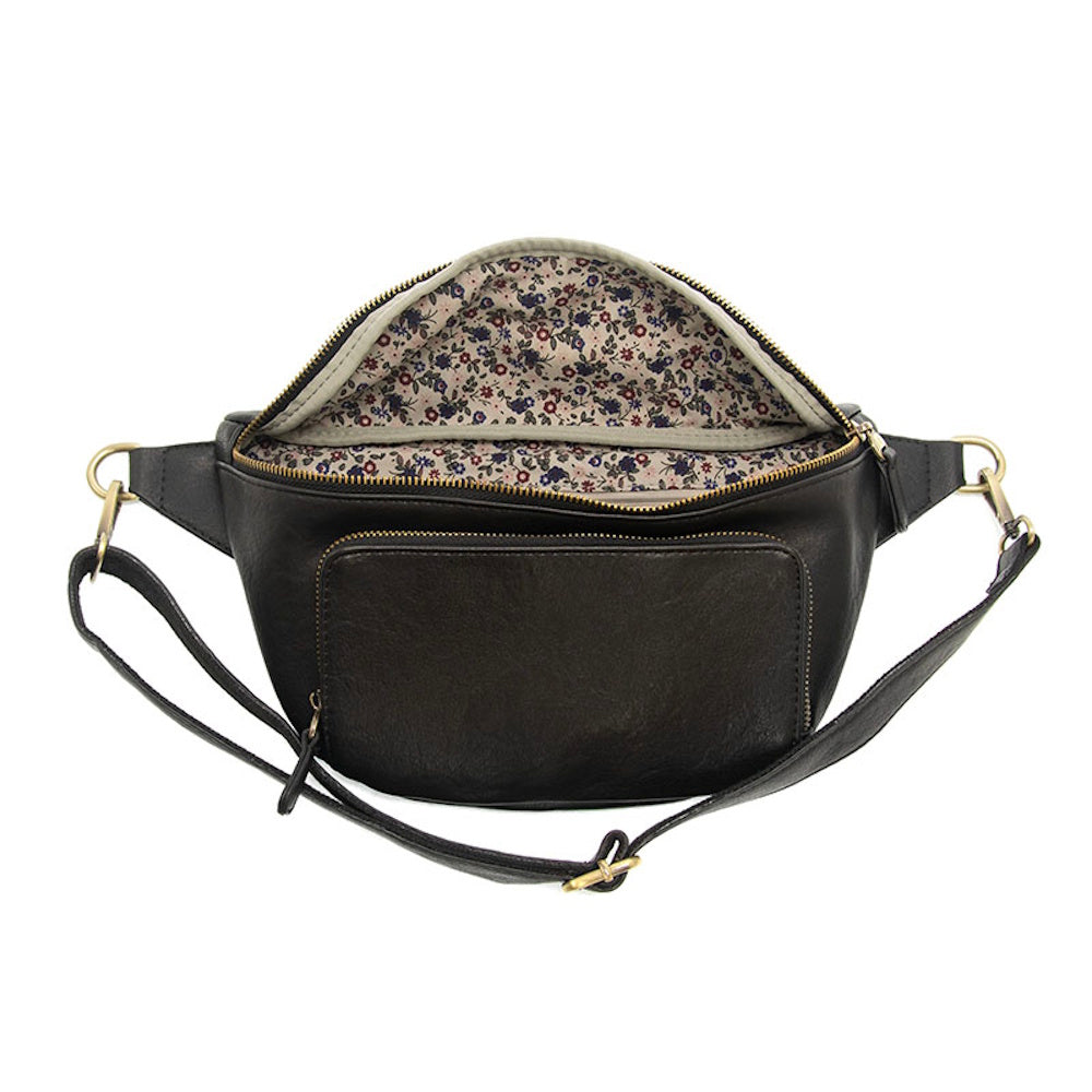 Black leather fanny pack with open zipper showing floral print lining, front pocket, and adjustable shoulder strap.