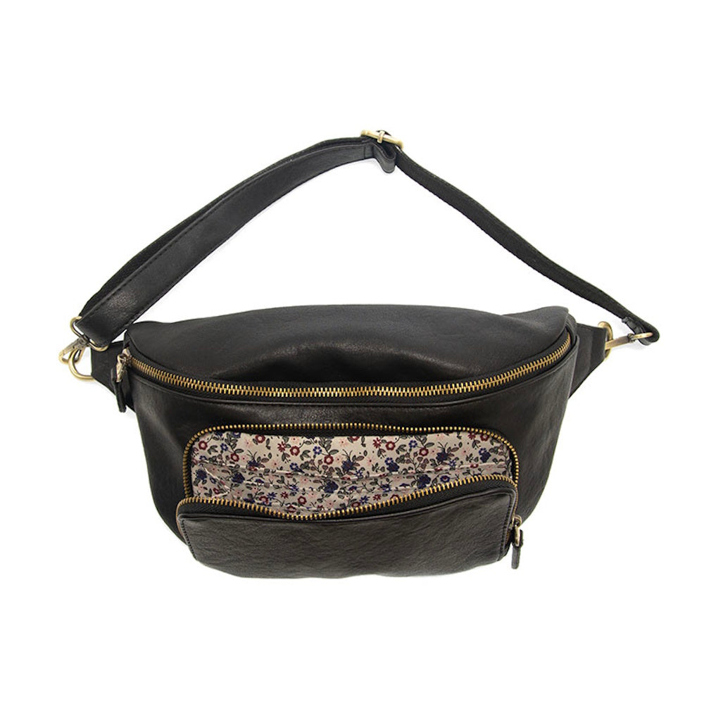 Black leather fanny pack with floral pattern front pocket, gold zippers, and adjustable shoulder strap for crossbody wear.