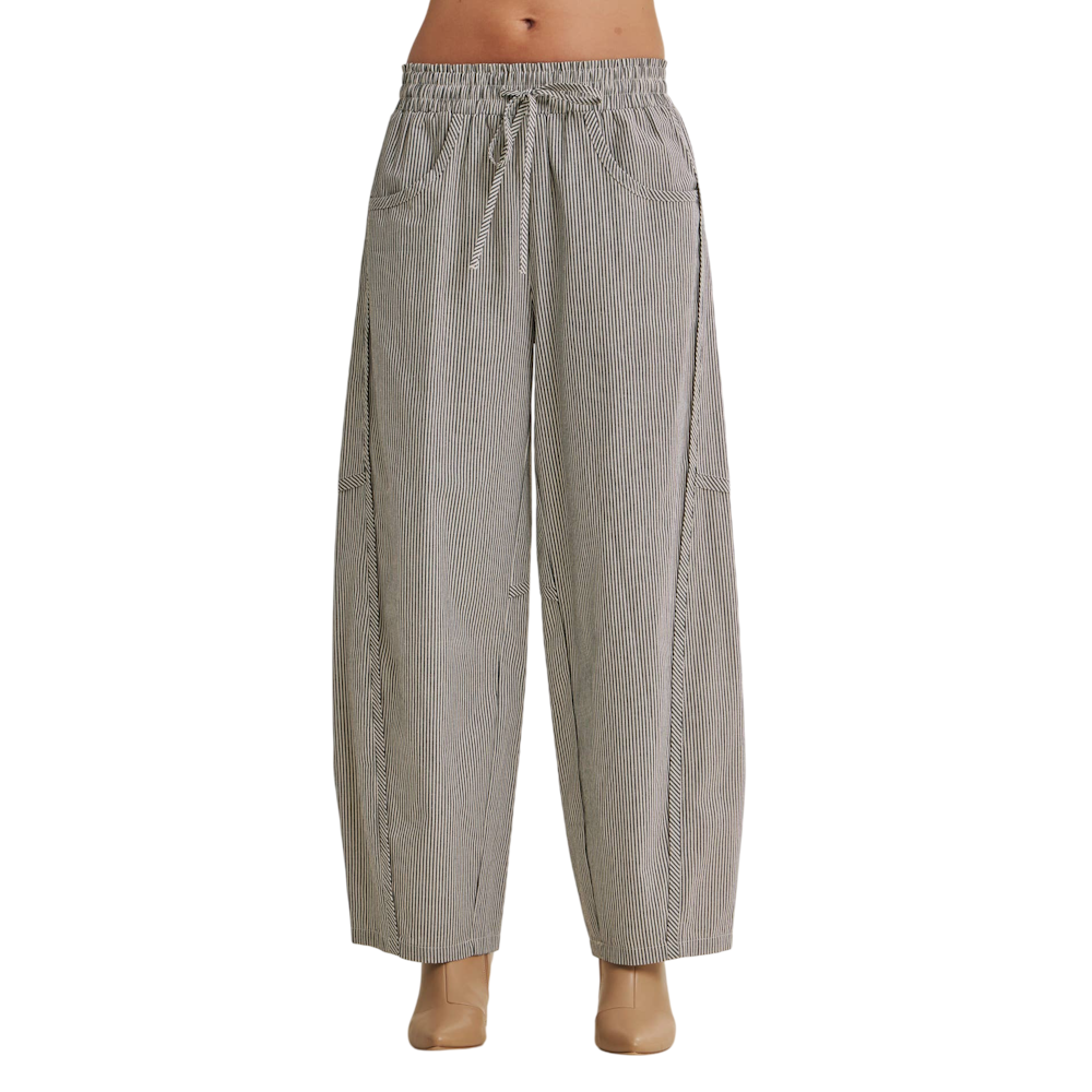 Relaxed-fit vertical pinstripe barrel-leg pants with a elastic drawstring waist and side pockets.