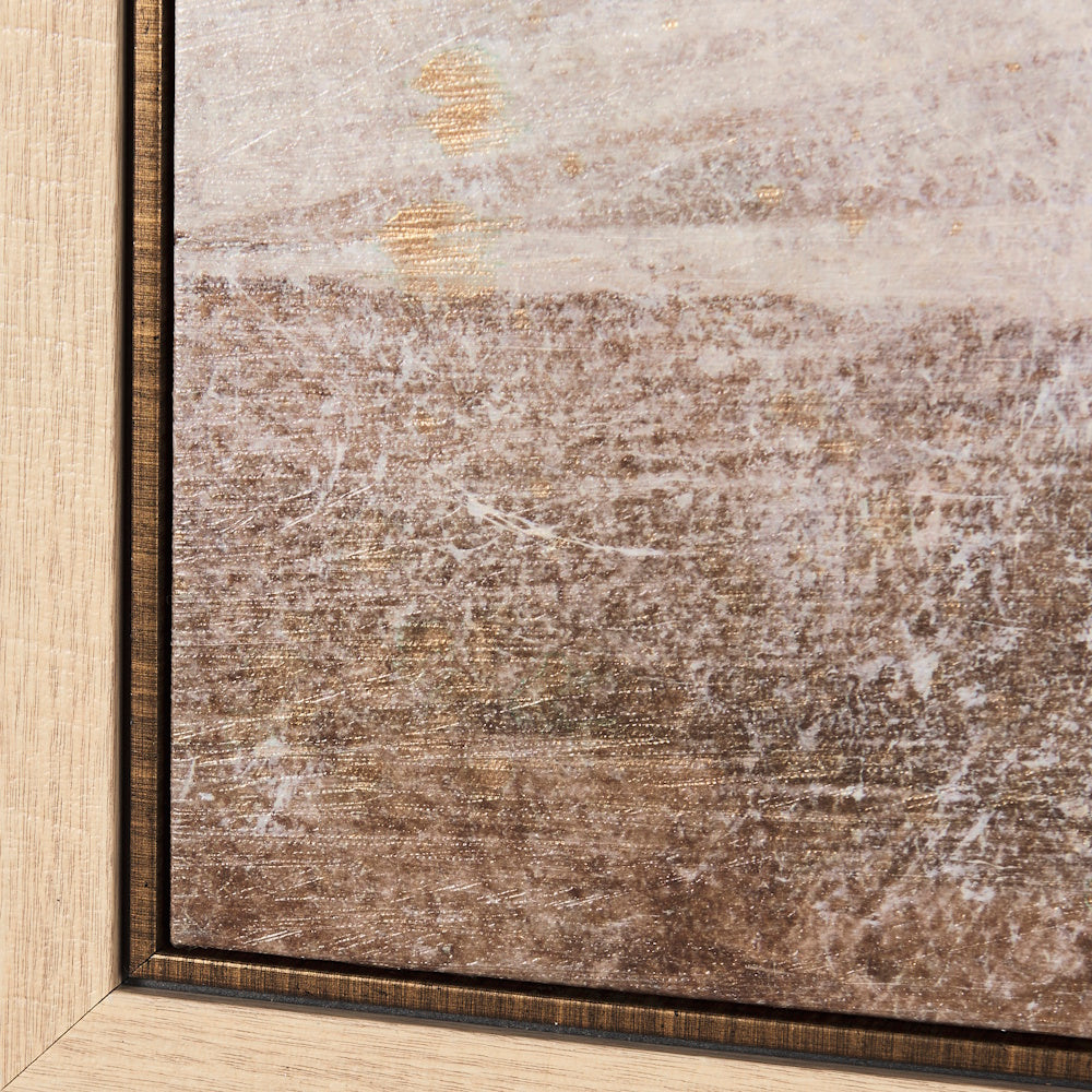 Close-up of the textured earthy brown and white canvas inside its light wood frame.