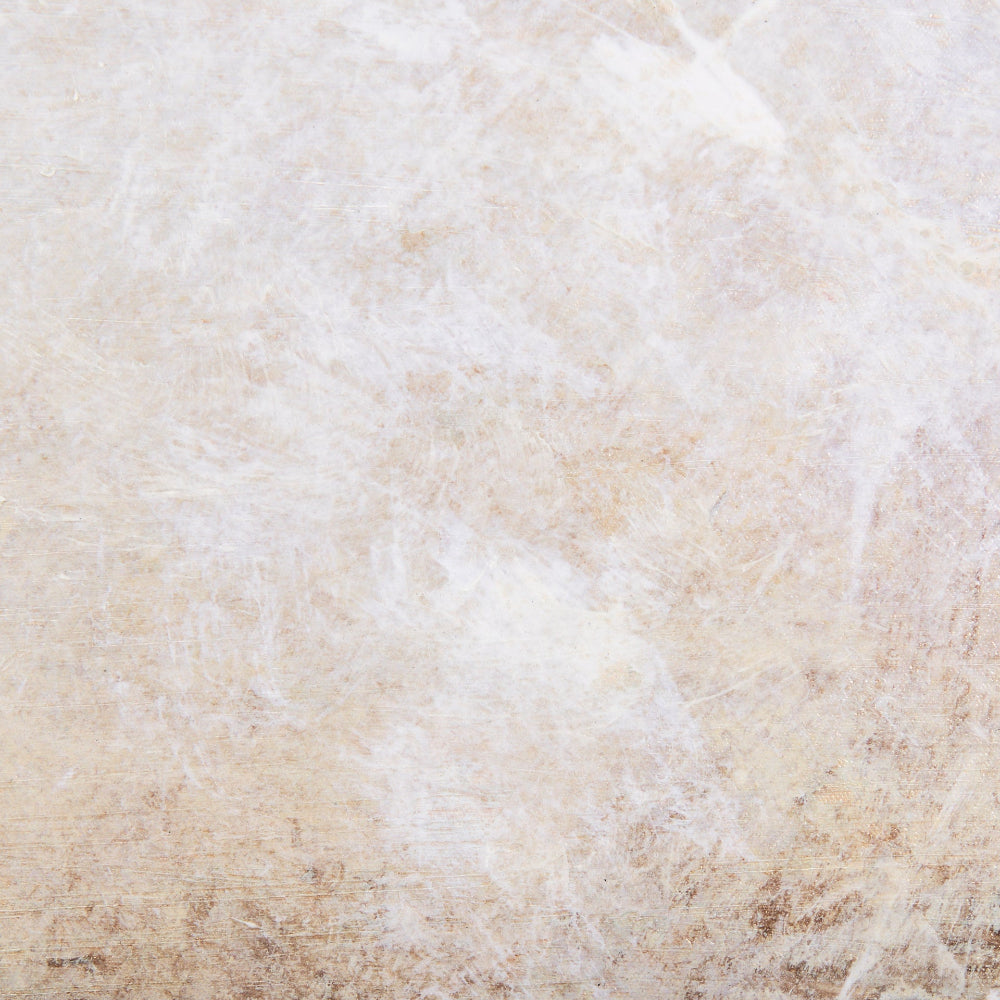 Close-up detail of smooth beige and white blended background texture on canvas.